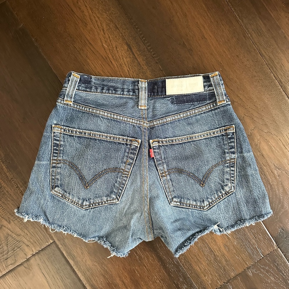 Re/Done Blue Distressed High-Rise Jean Shorts - Picture 2 of 2
